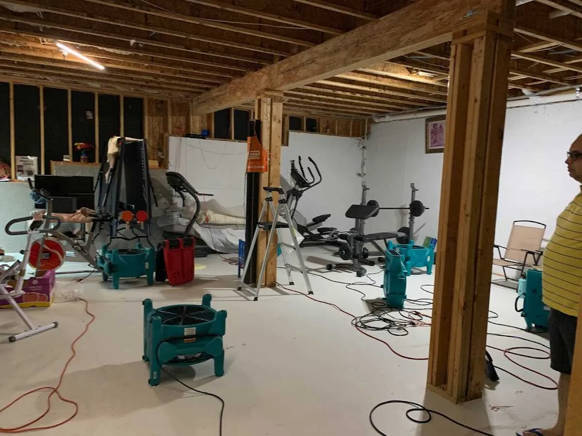 Basement drying equipment setup for Contents Cleaning & Restoration in Saginaw